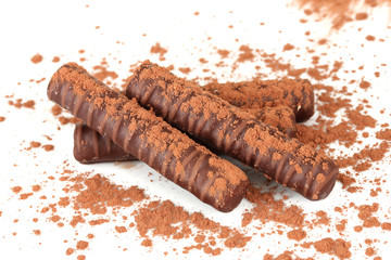 Chocolate sweets with cocoa, isolated on white