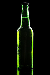 Bottle of beer on black background