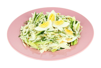 Delicious salad with eggs, cabbage and cucumbers, isolated