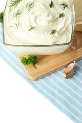 Sour cream in bowl close-up
