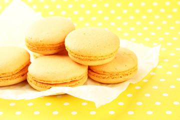Gentle macaroons on table close-up