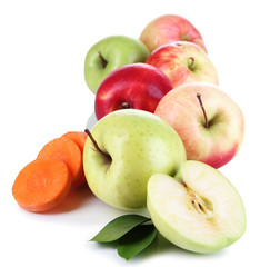 Sweet apples and carrots isolated on white
