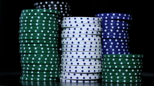 The difference color of casino chips.