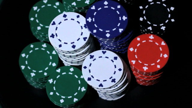 Stack of colorful poker chips.