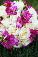 Bride's bouquet with wedding rings