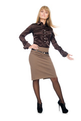 Young business woman in a full-length shows his hand to the side