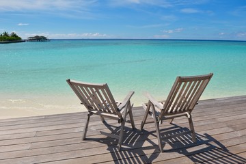 Fototapeta na wymiar tropical beach chairs
