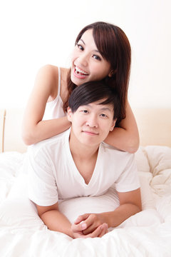couple happy smile in bed