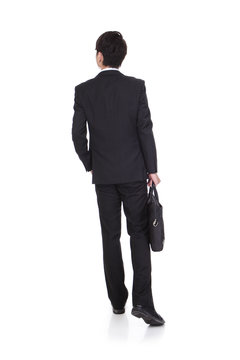 back view of a business man walking