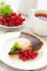 Chocolate tart with pears. Selective focus.
