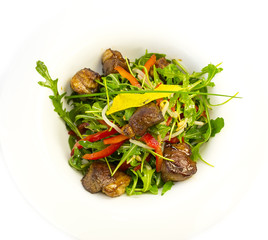 duck with arugula on a white background in the restaurant
