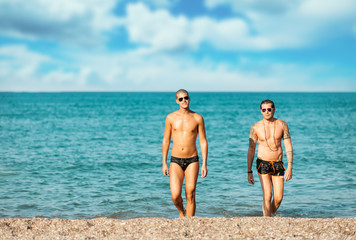 Fototapeta na wymiar Gay Couple at the beach