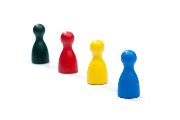 Row of multi colored play figures