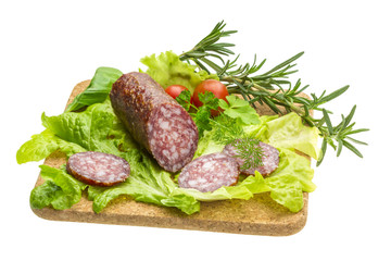 Salami with rosemary, salad and tomatoes