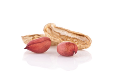peanuts cracked open isolated on a white background