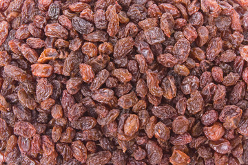 Crimson Raisins background texture close up detail.