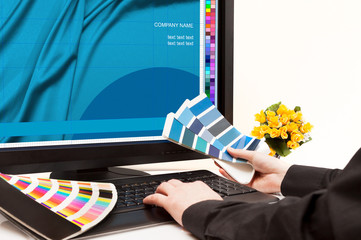 Designer at work. Color samples.