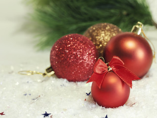 Fototapeta na wymiar Christmas decorations and fir branch