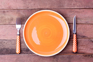 empty plate and fork, knife