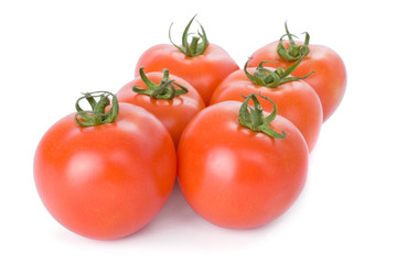 Ripe tomatoes isolated on a white background