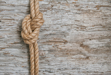 Fototapeta premium Ship rope and wood background