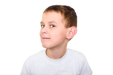 Close up portrait of boy listening with attention