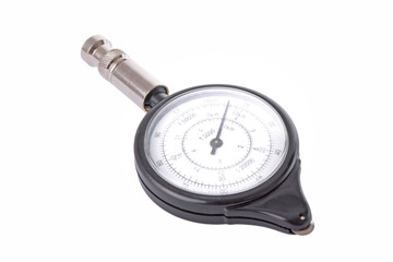 Analogue map measurer isolated on a white background.