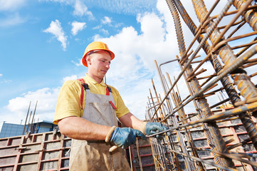 construction worker making reinforcement