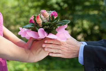 Man giving a flowers