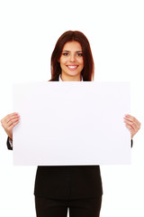 Businesswoman holding a banner and looking at camera