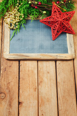 Christmas background with chalkboard and ornaments