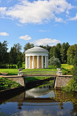 Fototapeta na wymiar Summer landscape of the Pavlovsk garden. Temple of Friendship