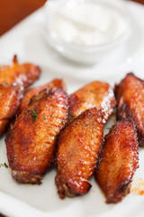 Chicken wings with sauce