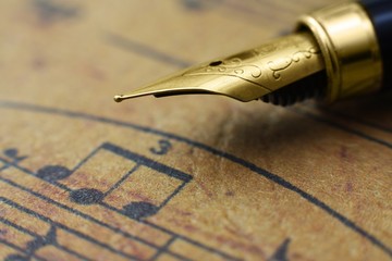 Music sheet and pen