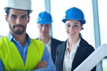 business people and engineers on meeting