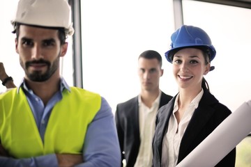 business people and engineers on meeting