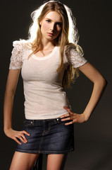 Portrait of pretty young woman in white clothing