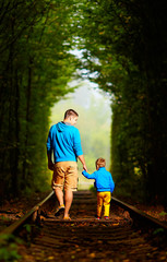 father and son together in railway green tonel