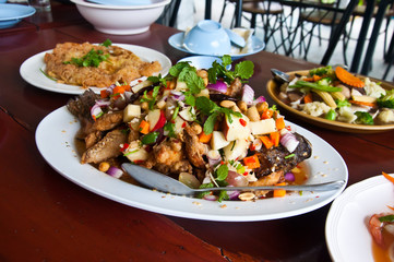 Herb salad with deep fried fish and lemongrass