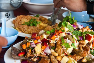 Herb salad with deep fried fish