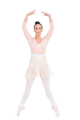 Focused attractive ballerina standing on her tiptoes © lightwavemedia