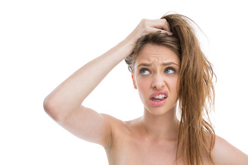 Bare natural woman making pony tail with her hair