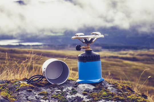 Gas camping stove and pot in the mountains