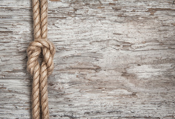 Ship rope and wood background