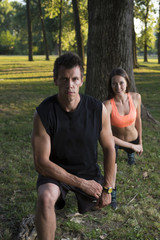 Young couple exercising in a park