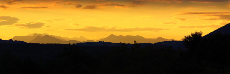 Mountain range - panoramic view at sunset