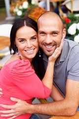 Fototapeta premium Happy smiling middle-aged couple outdoors