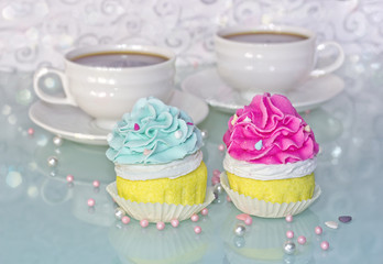 pink and blue cupcakes and coffee