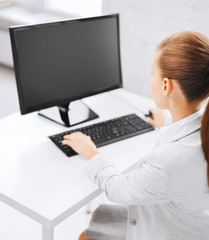 businesswoman with computer in office