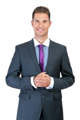 Portrait of a smiling young business man, isolated on white back